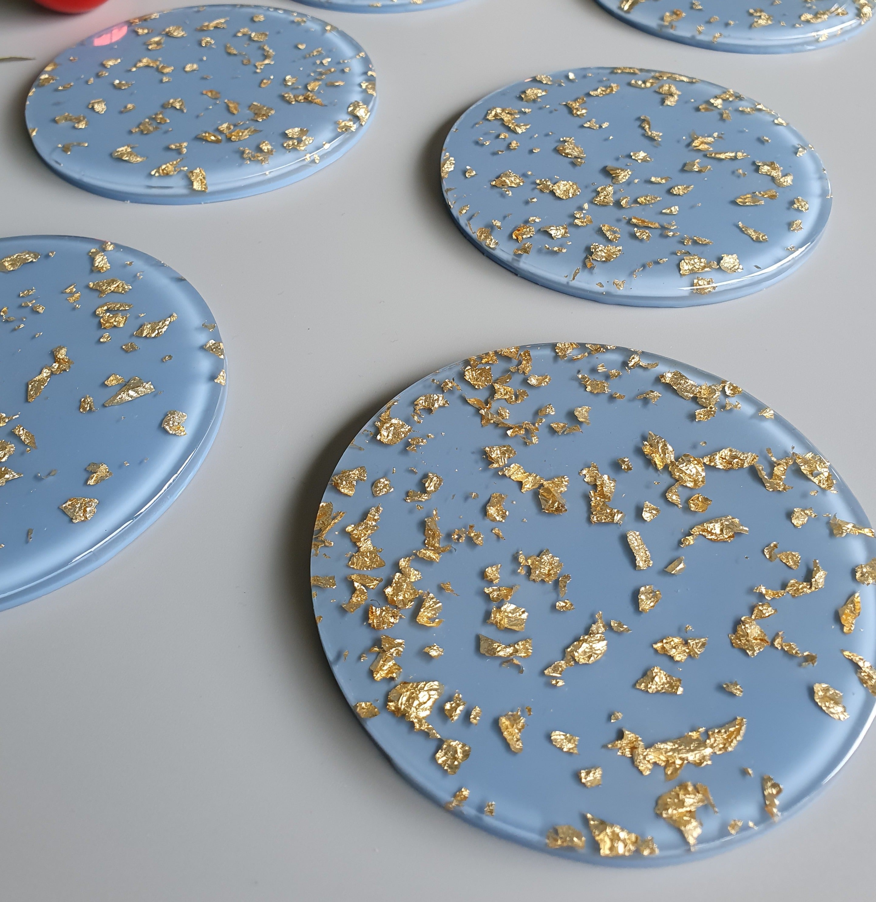 Resin Coaster Gifts, blue gold foil resin coaster made the perfect size for wine glasses and cups of all sizes. Unique resin coaster will make a great housewarming, engagement gift or present for any occasion. Handmade functional art that brightens your office or home decor. Resin coaster set custom made to order.