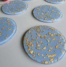 Load image into Gallery viewer, Resin Coaster Gifts, blue gold foil resin coaster made the perfect size for wine glasses and cups of all sizes. Unique resin coaster will make a great housewarming, engagement gift or present for any occasion. Handmade functional art that brightens your office or home decor. Resin coaster set custom made to order. 
