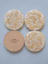 Load image into Gallery viewer, Resin Coaster Gifts, Beige gold foil resin coaster made the perfect size for wine glasses and cups of all sizes. Unique resin coaster will make a great housewarming, engagement gift or present for any occasion. Handmade functional art that brightens your office or home decor. Resin coaster set custom made to order.
